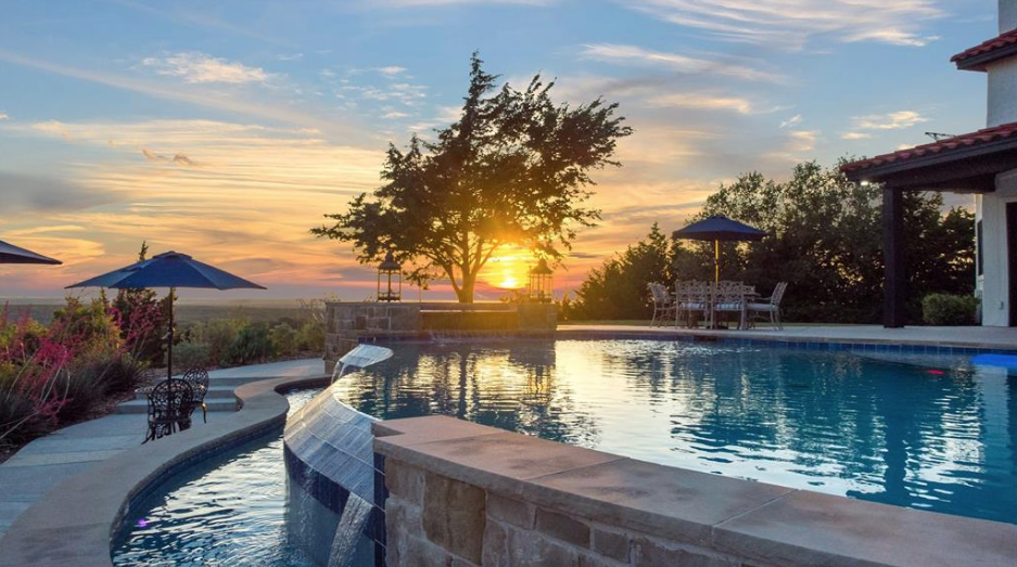 The vast pool flanks a 3,000 square foot pools houses at 2721 Old Decatur Road in Decatur