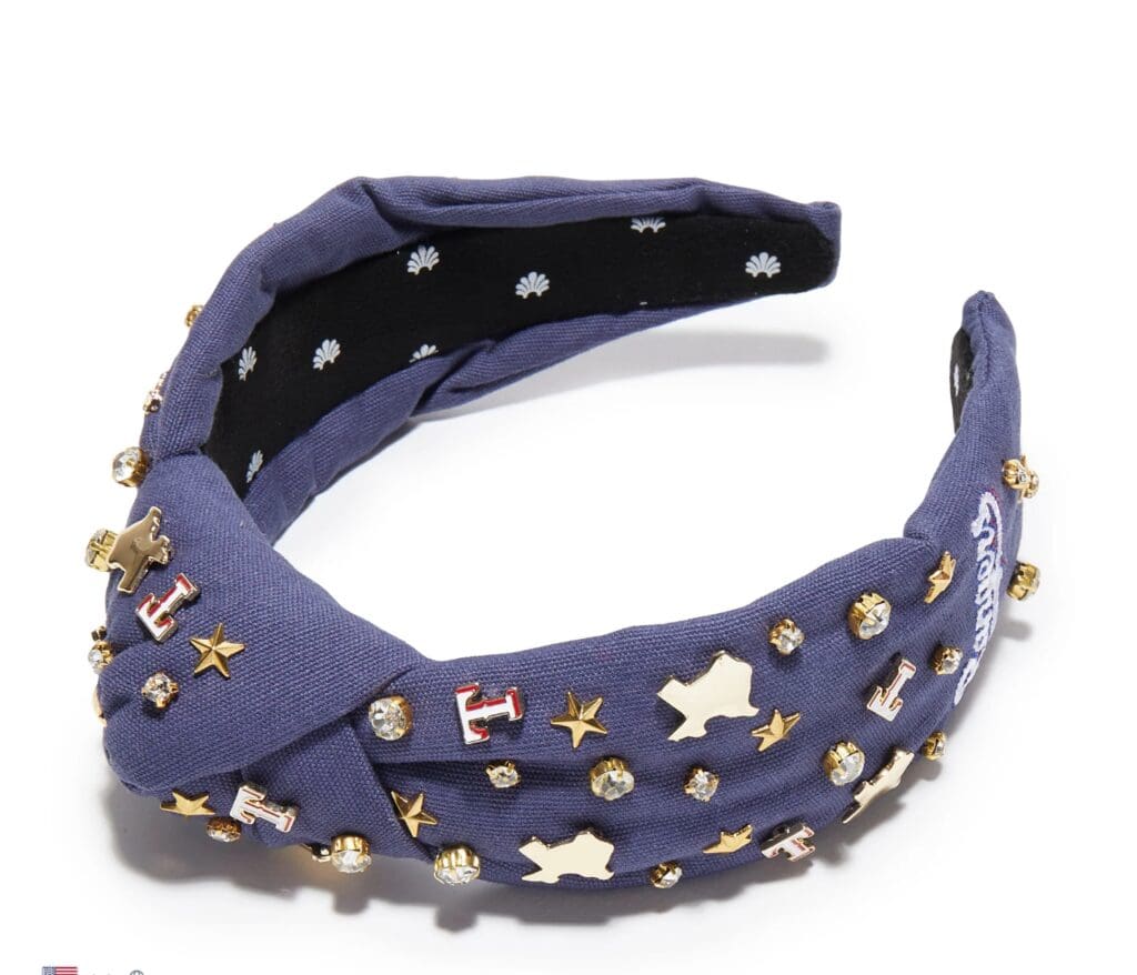Beads and pearls decorate the Lele Sadoughi headband salute to the Texas Rangers.