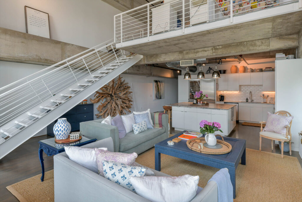 Another view of the living and kitchen area in the Uptown Dallas condo.