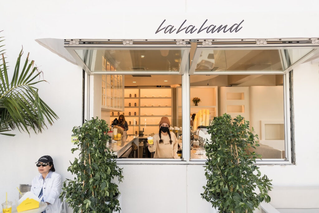 Grab a matcha latte topped with coconut foam at La La Land Kind Cafe.