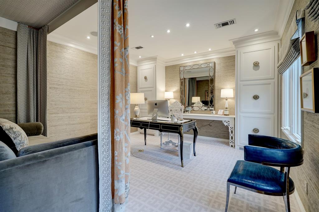 Another view to the secondary bedroom in the luxurious 'Tuscan Villa' townhome at 5722 Logan Lane (Photo by TK Images/Compass)