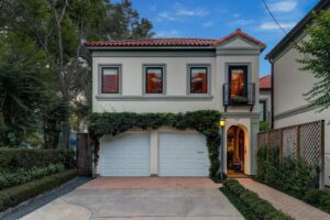 The luxurious 'Tuscan Villa' townhome at 5722 Logan Lane is listed with Compass for $1,295,000. (Photo by TK Images/Compass)