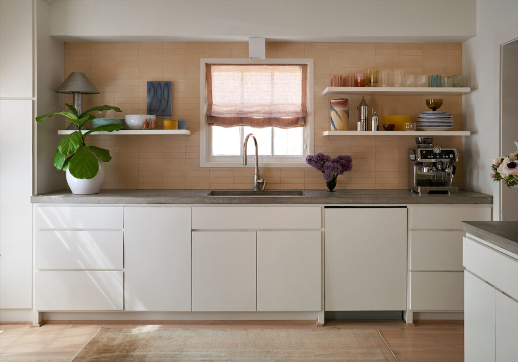 Handmade tiles from Clé. Custom cabinets, concrete countertop. Chinese 1970s rug. (Photo by Pär Bengtsson)