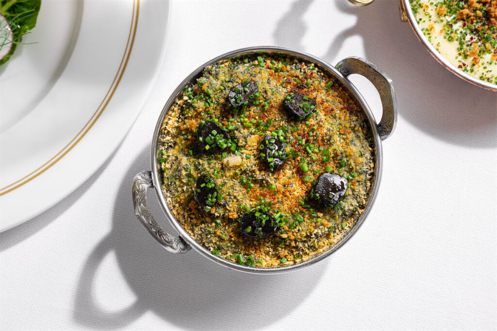 Mister Charles serves globally-inspired French and Italian dishes including steaks and seafood. (Photo by Evan Sung)