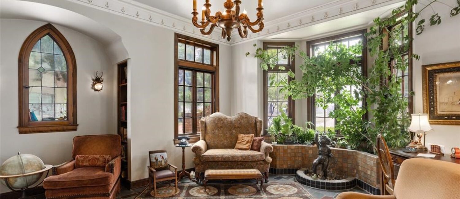 2424 Medford Court – A charming conservatory or library with its historic details on full display.