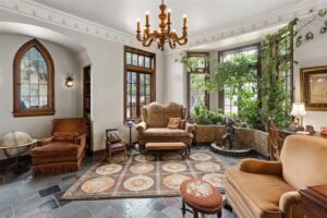 2424 Medford Court – A charming conservatory or library with its historic details on full display.