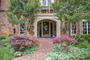 2424 Medford Court – The brick and stonework welcome you at the entrance – craftsmanship on display as you enter.