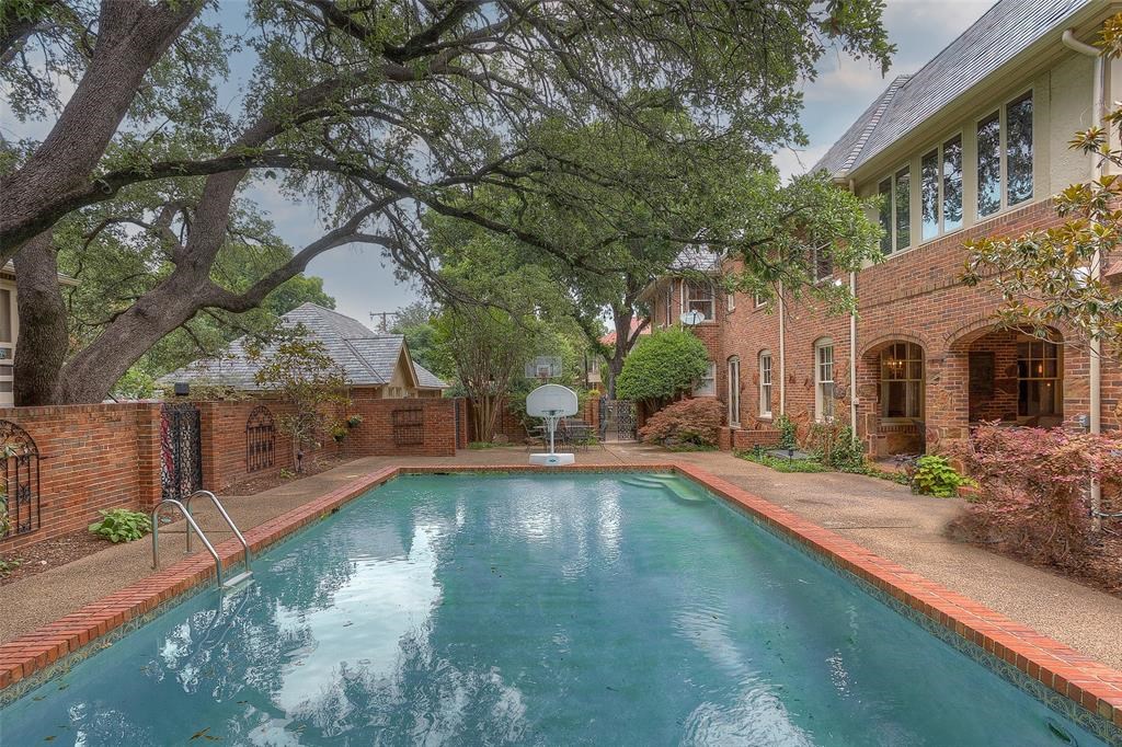 The oak shaded pool with mature landscape in Fort Worth's Park Hill.