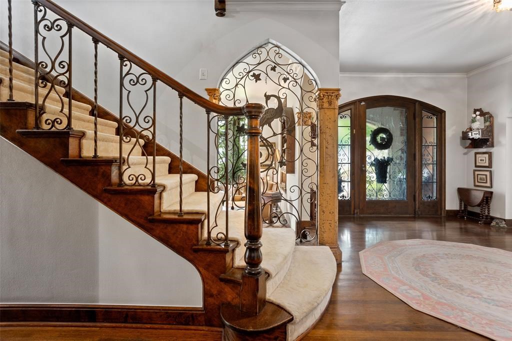 2424 Medford Court - historic ironwork and woodwork on display in the entry.