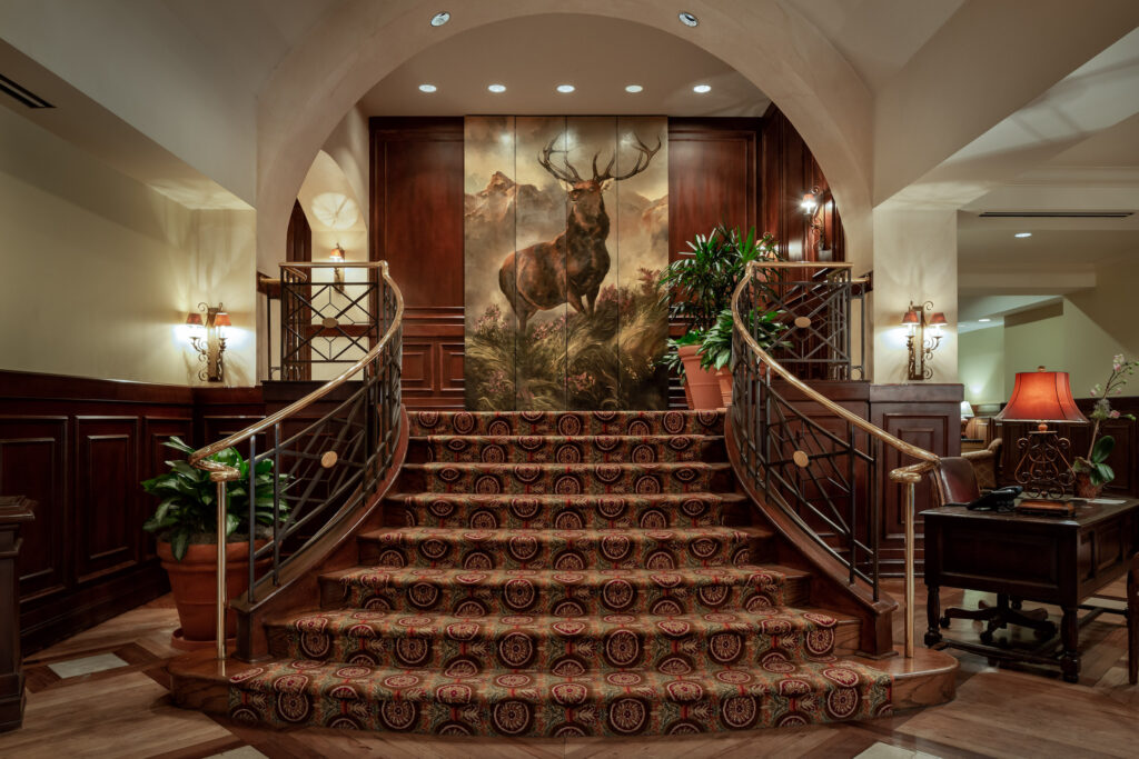The lobby staircase at The Houstonian Hotel, Club & Spa which earned top rankings at the best resort in Texas for the second year.