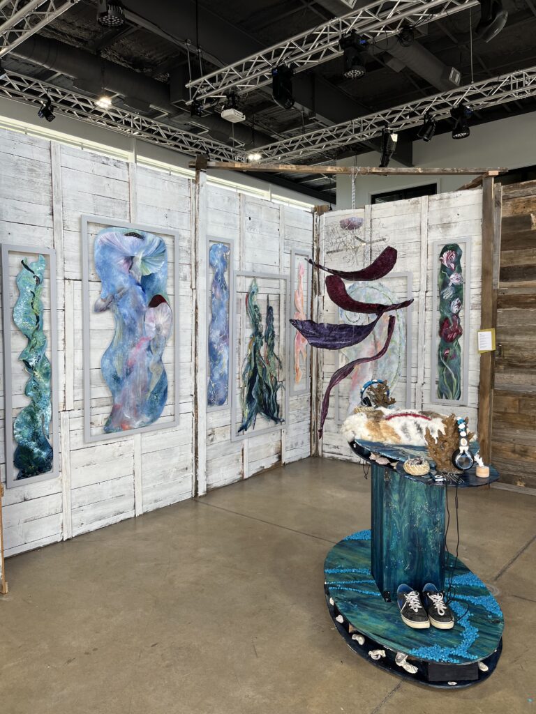 M E Klesse's "Walk A Mile In Their Shoes," 2023, at "Multi-Zen-Sery" at The Alta Arts (Photo by Brittany Ellis)