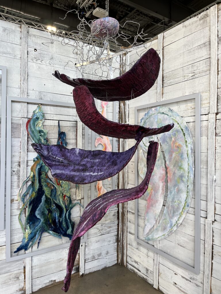 M E Klesse's "Walk A Mile In Their Shoes," 2023, engages all five senses and depicts the turmoil of climate change in the modern world at "Multi-Zen-Sery" at The Alta Arts (Photo by Brittany Ellis)