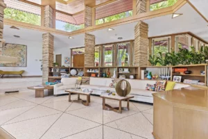 Brachman – Triangular shapes repeat, in the flooring, lighting soffits and stone pillars