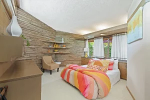 Brachman – interesting angles and wood and stone finishes