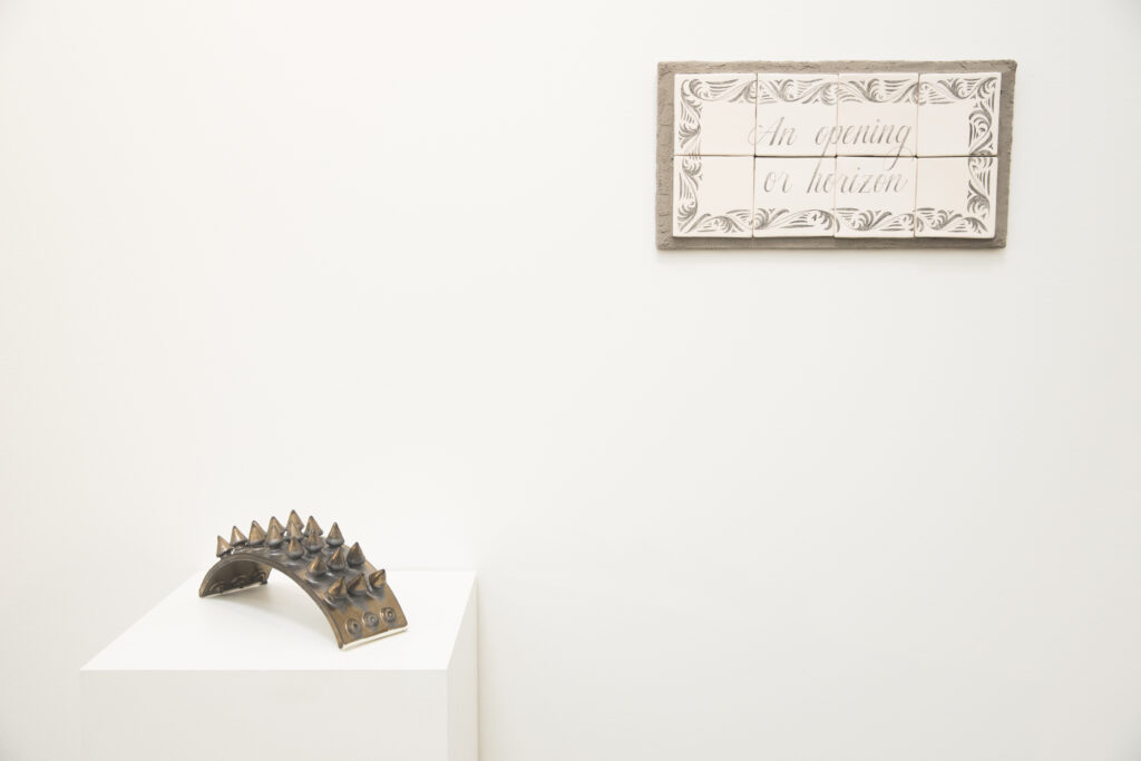 "Bridge II" and "Street sign" by Tamara Santibañez at "I, Ruby: Vol. 1" 
 (Photo by Hung Ngo)