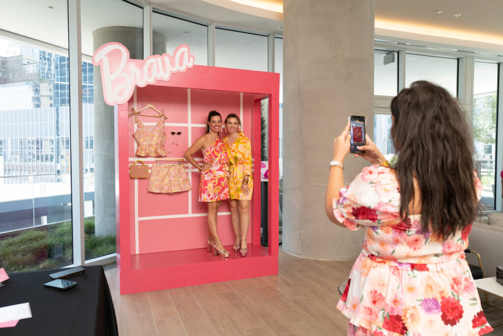 Elise Arango, Katie Higgins at the Barbie-inspired pool party at HInes' Brava, the downtown residential high rise.