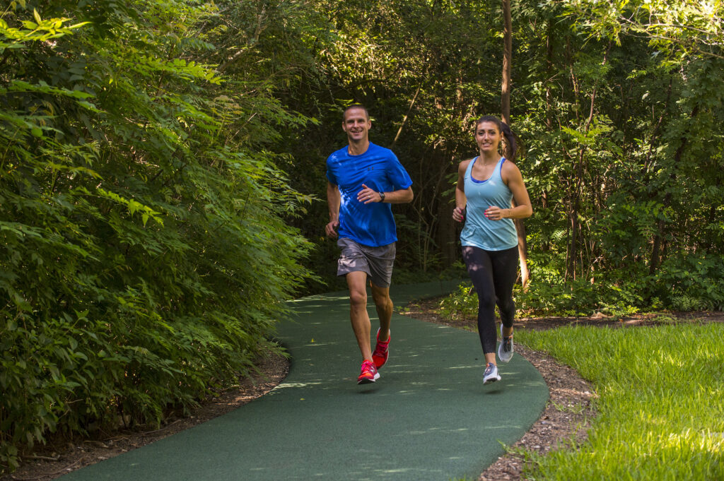 Joggers on the trail at The Houstonian Hotel, Club & Spa.