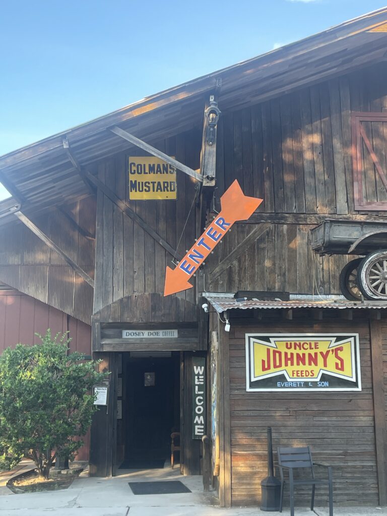 The main entrance of Dosey Doe is in the back, with easy parking behind the barn.