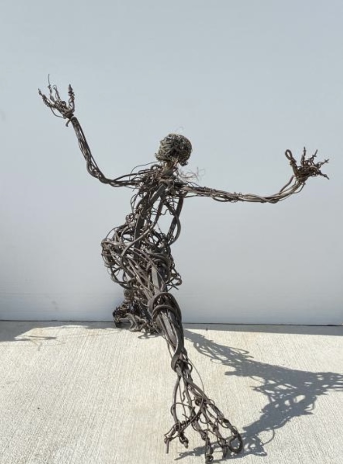 Jesse Lott's "Running Man," 2008, formed from steel, copper, brass, and found objects embodies the artist's way with a wide range of often discarded materials. (Courtesy Deborah Colton Gallery, Houston)