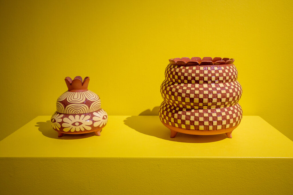 Two terracotta vessels in Gabo Martinez's “The Land of Flowers” at Houston Center for Contemporary Craft (Photo by Katy Anderson)