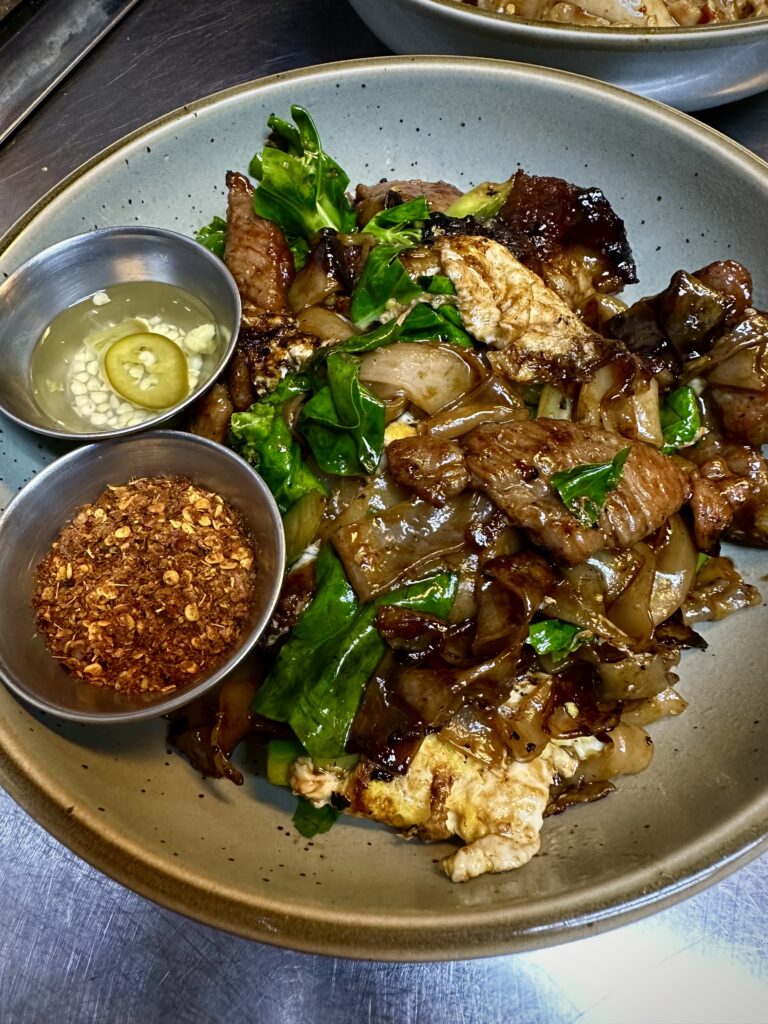 Street to Kitchen, an East End eatery bills itself as serving authentic Thai fare with dishes like this Pad See Ew. (Photo by Courtesy of Street to Kitchen)