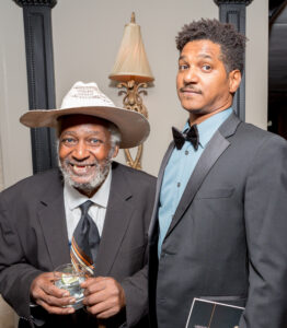 Artists Jesse Lott and Angelbert Metoyer attended the Texas Artist of the Year Gala for Art League Houston’s 2016 Lifetime Achievement Award, which was presented to Jesse Lott. Lott mentored Metoyer for many years. (Photo by Alex Barber, courtesy Art League Houston)