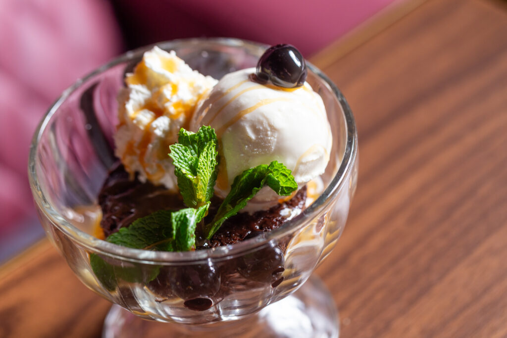 The cinema's dessert menu includes a decadent fudge brownie.  