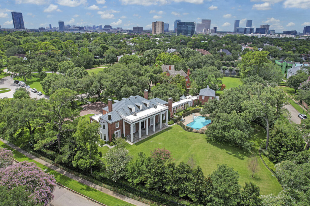 The Birdsall Briscoe mansion at 3425 
Sleepy Hollow Court in River Oaks is nestled amid live oaks on a 1.6-acre lot. (Photo by TK Images/Courtesy of Compass)
