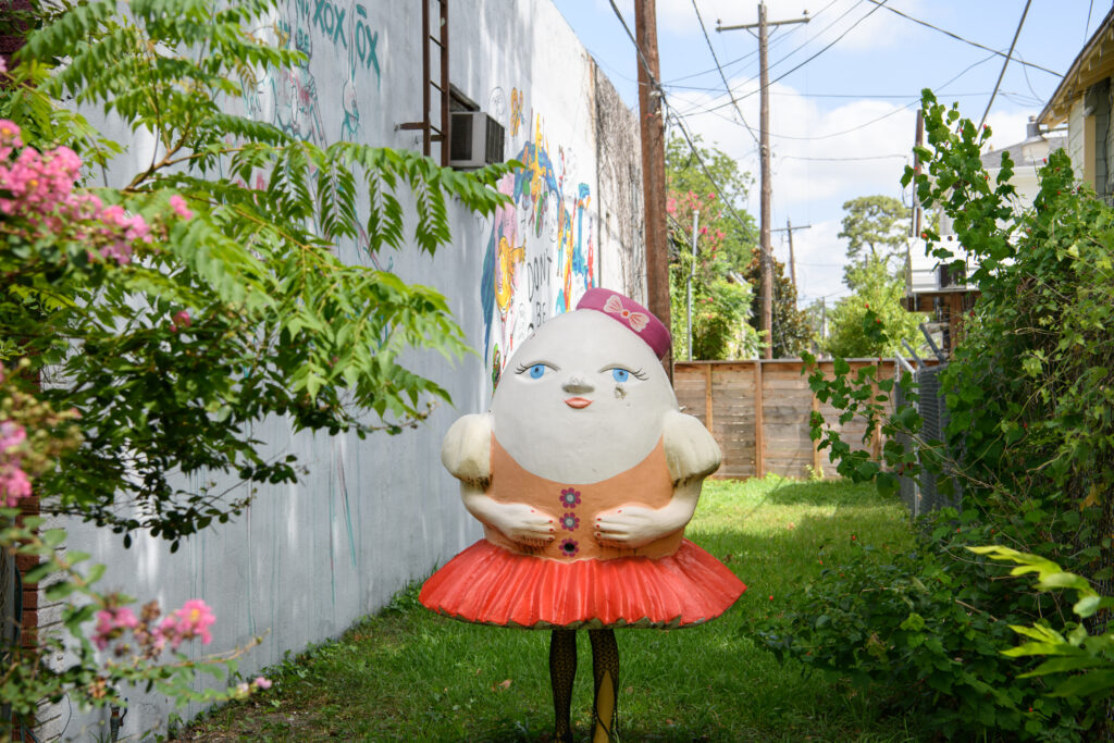 "Humpty Dumpty" by Yuliya Lanina, standing guard by the Daniel Johnston mural (Photo by Saranna Zhang/Kevin Zhang Photography)