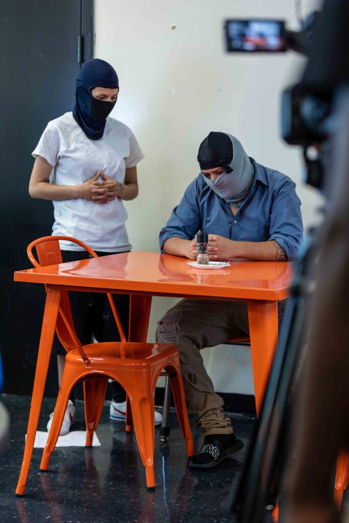 Behind the scenes of "Border Life" during the spring 2023 filmmaking residency with the Juvenile Probation Department (Photo by Jonathan Myers)