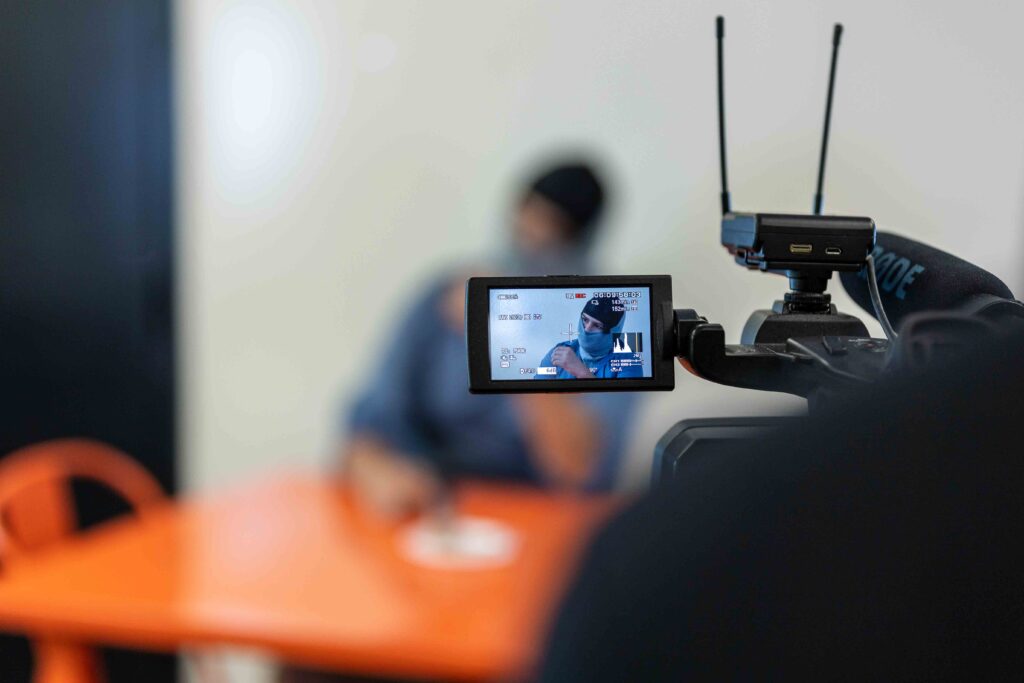 Behind the scenes of "Border Life" during the spring 2023 filmmaking residency with the Juvenile Probation Department (Photo by Jonathan Myers)