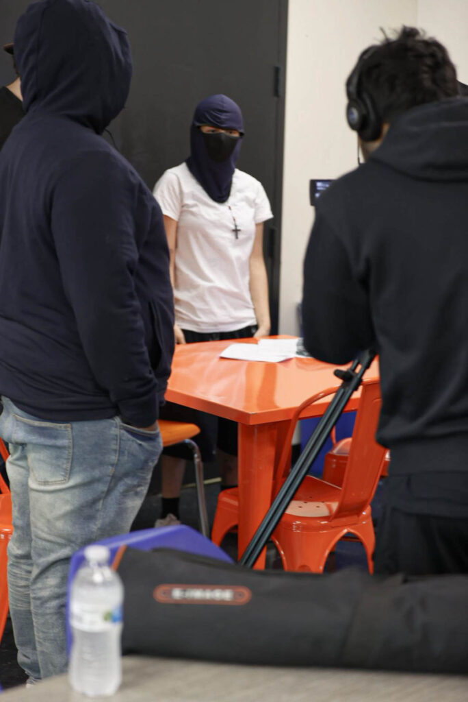Behind the scenes of "Border Life" during the spring 2023 filmmaking residency with the Juvenile Probation Department (Photo by Jonathan Myers)