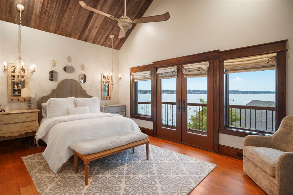 Bedrooms have a view overlooking Lake Conroe in the home at 9144 Escondido Drive.  (Photo by EmoMedia/Compass)