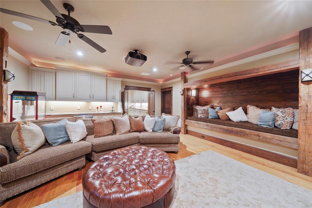 The second floor media room at 9144 Escondido Drive on Lake Conroe. (Photo by EmoMedia/Compass)