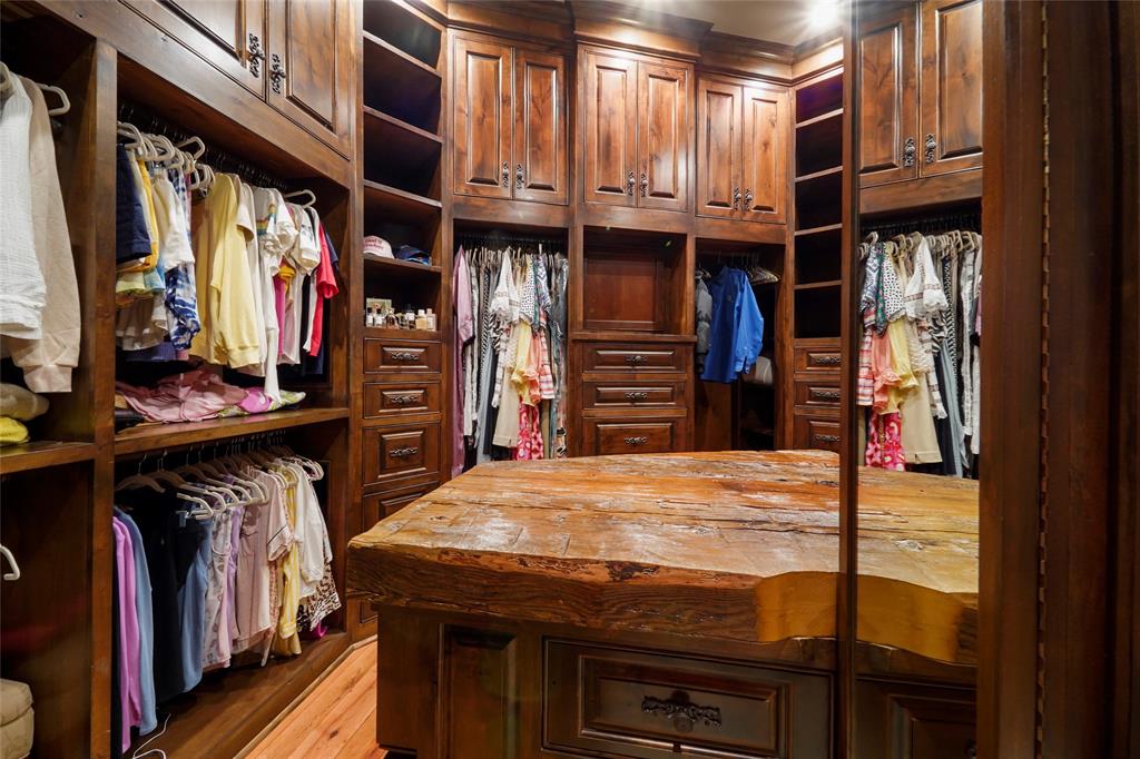A generous walk-in closet at 9144 Escondido Drive on Lake Conroe. (Photo by EmoMedia/Compass)