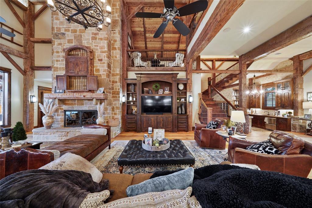 The great room at 9144 Escondido Drive offers views to Lake Conroe. (Photo by EmoMedia/Compass)