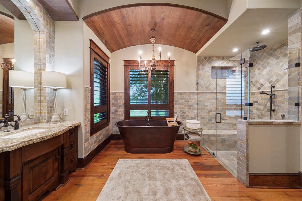 One of two primary baths at 9144 Escondido Drive.  (Photo by EmoMedia/Compass)