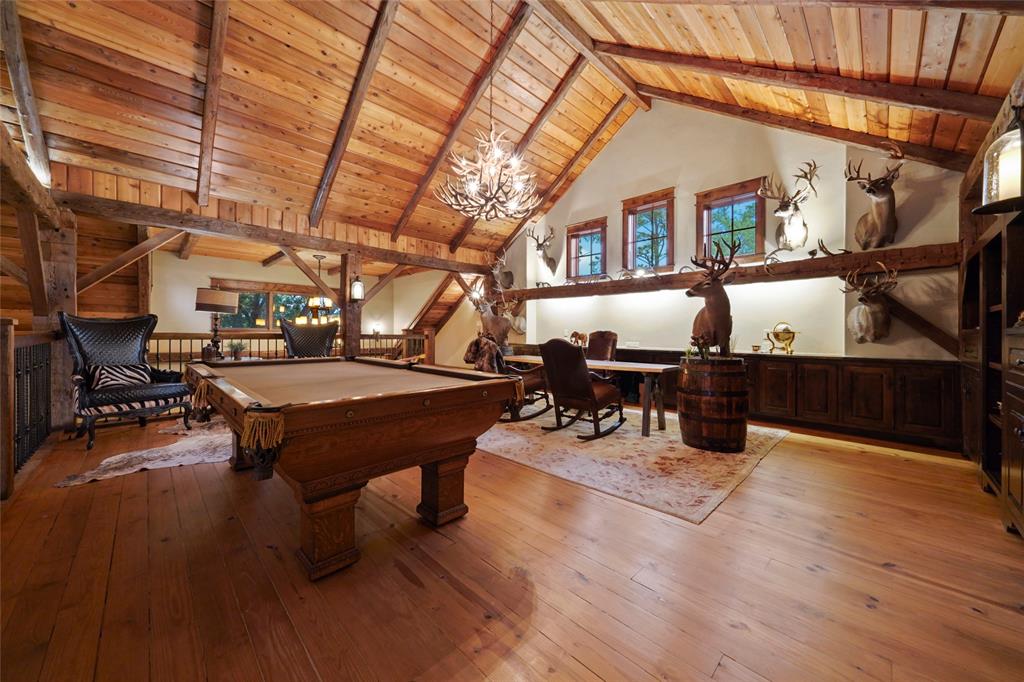  The second floor game room at 9144 Escondido Drive on Lake Conroe. (Photo by EmoMedia/Compass)