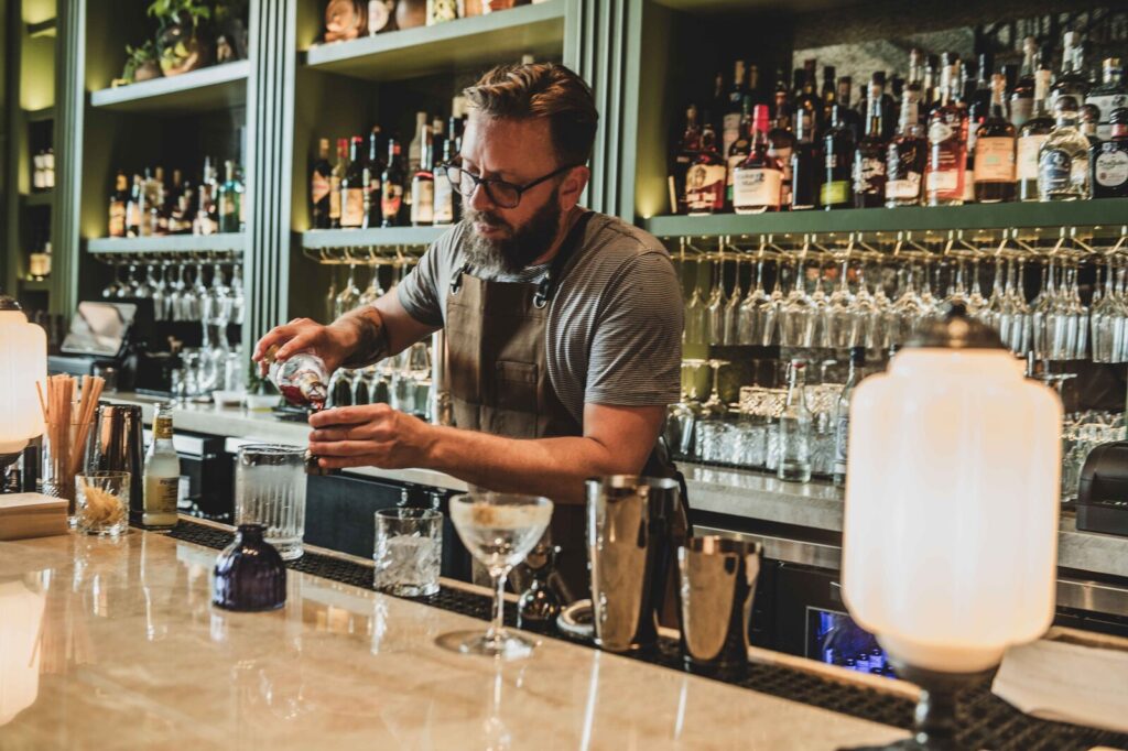 The bar at Via Triozzi offers wine, spirits, and Italian-inspired cocktails. (Courtesy of Via Triozzi)