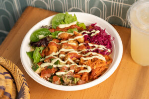 Tangier Bowl at ZOA (shrimp, pickled red onion cabbage, greens, cinnamon, carrots, cucumber, tomato, tomato chermoula, zesty mint avocado yogurt).jpg (Photo by Courtesy of ZOA Mediterranean Kitchen)