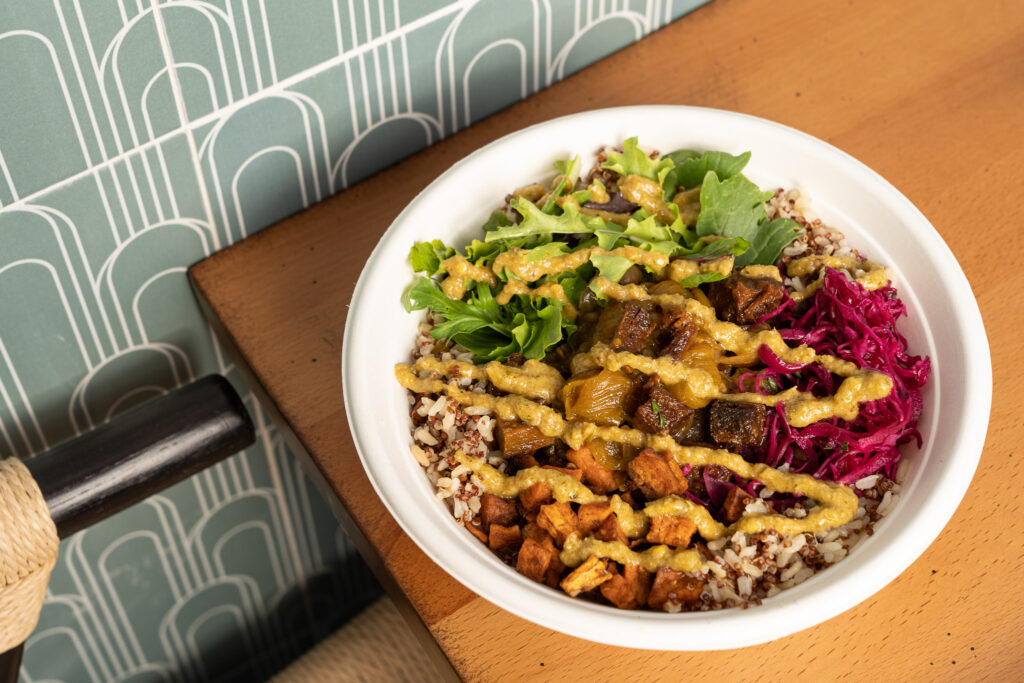 ZOA's Marrakesh Bowl is composed of beef tagine, onions, greens, pickled red onion cabbage, sweet potato, and green harissa.  (Photo by Shawn Chippendale)