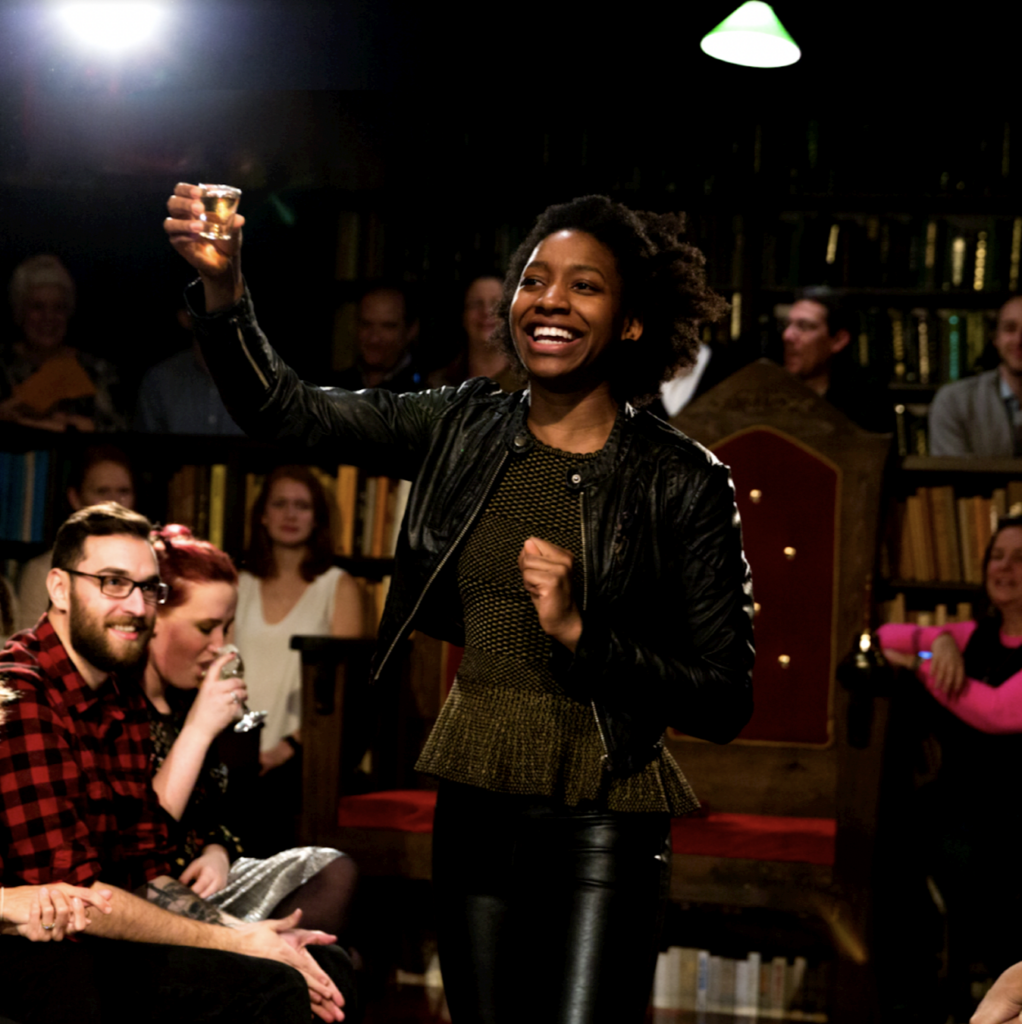 Another drunk actor raises a toast to the audience.  (Photo by © Drunk Shakespeare)