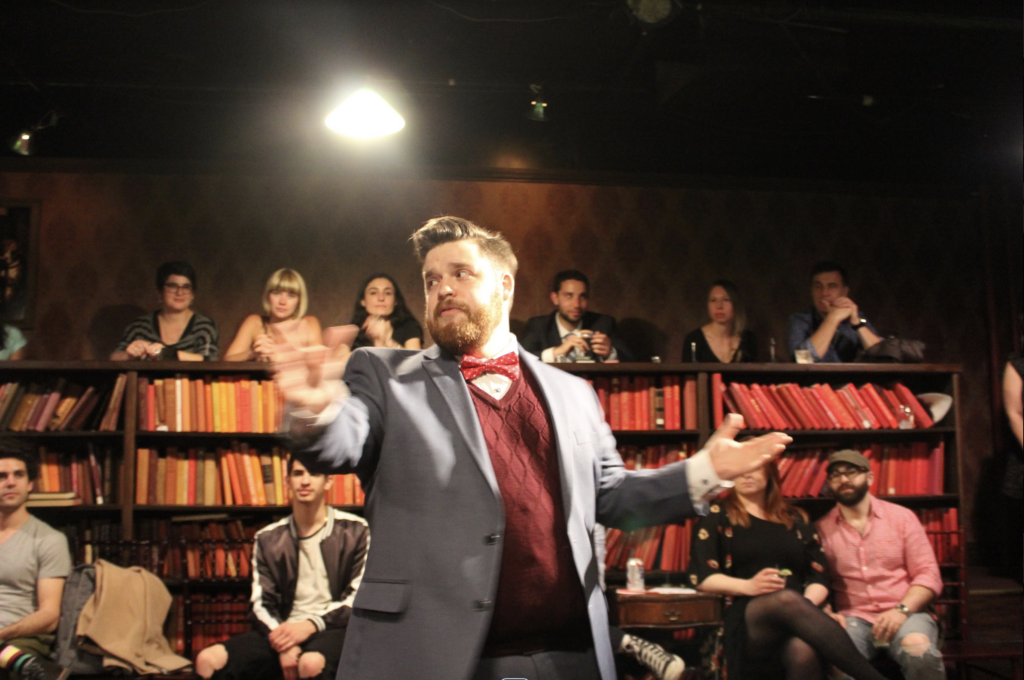 The host sets the scene and and prepare the audience for a night filled with booze and The Bard! (Photo by © Drunk Shakespeare)