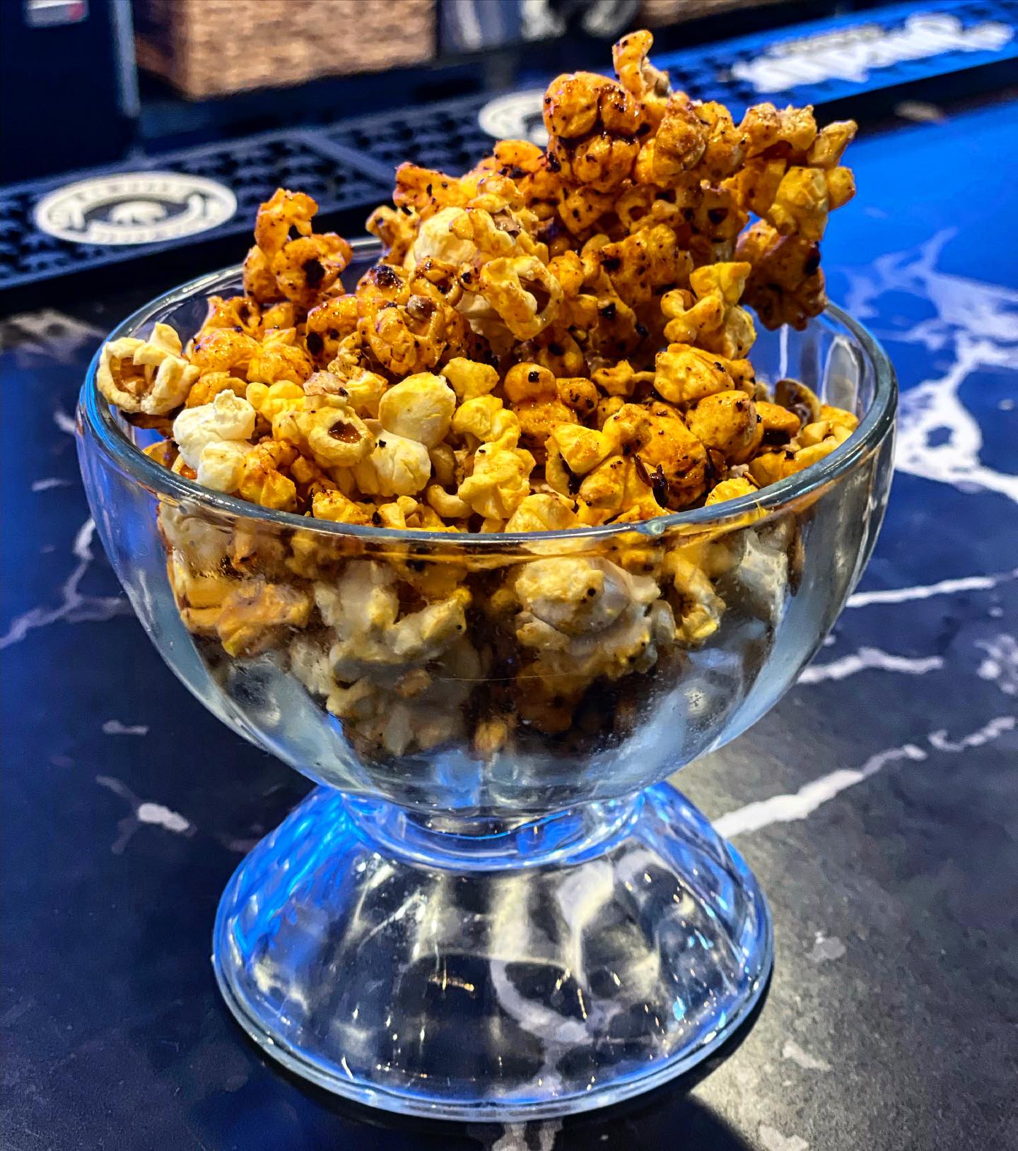 Chili crunch caramel corn form is one of the dishes you'll be able to get at Eazy Monkey.