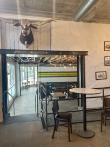 Eazy Monkey – The flow from the bar through both dining areas at Eazy Monkey on Magnolia. (Photo by Courtney Dabney)