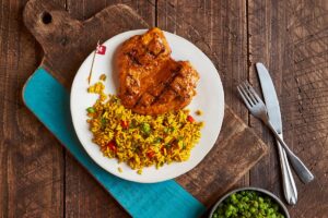 Flame-grilled Butterfly Chicken Breast with Portuguese Rice and Macho Peas