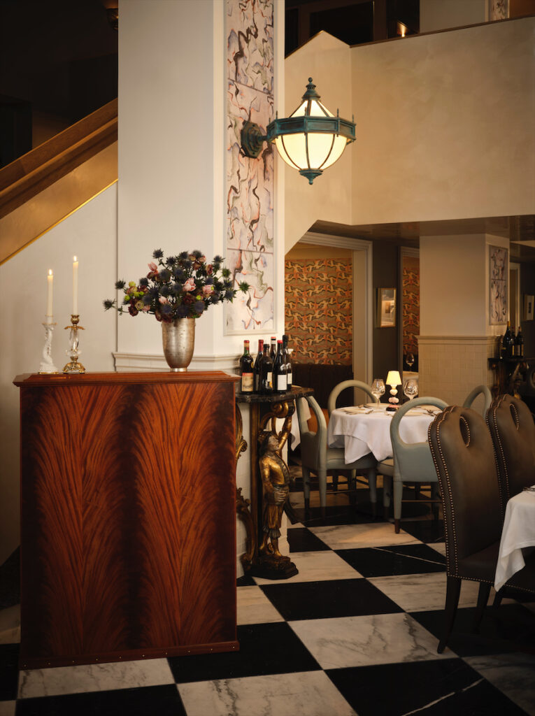 An elegant hostess stand greets guests at Mister Charles.  (Photo by Douglas Friedman)