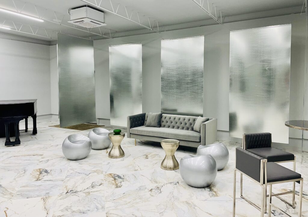 House of NeVille - Rotating artworks will hang against floating galvanized sheets of steel. (Photo by Courtney Dabney)