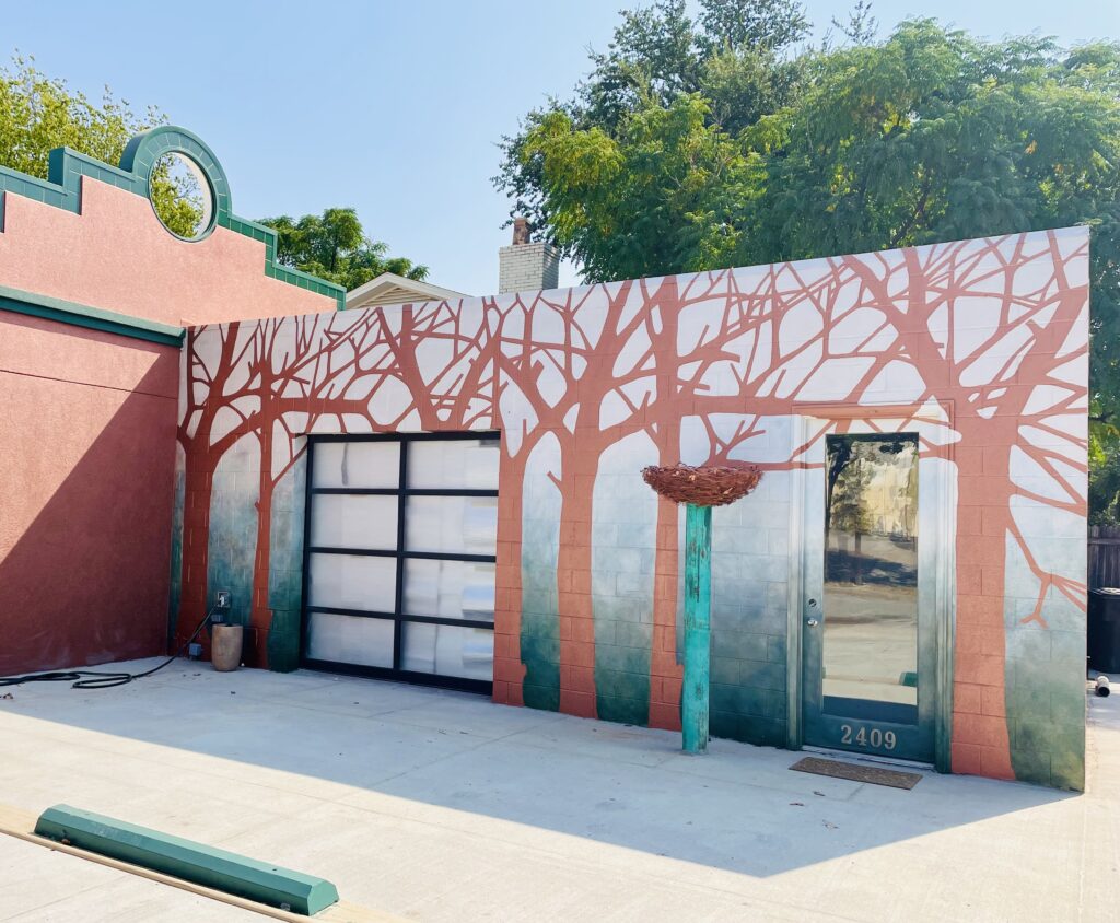 The new copper colored nest is perched in front of a stand of trees at House of NeVille. (Photo by Courtney Dabney