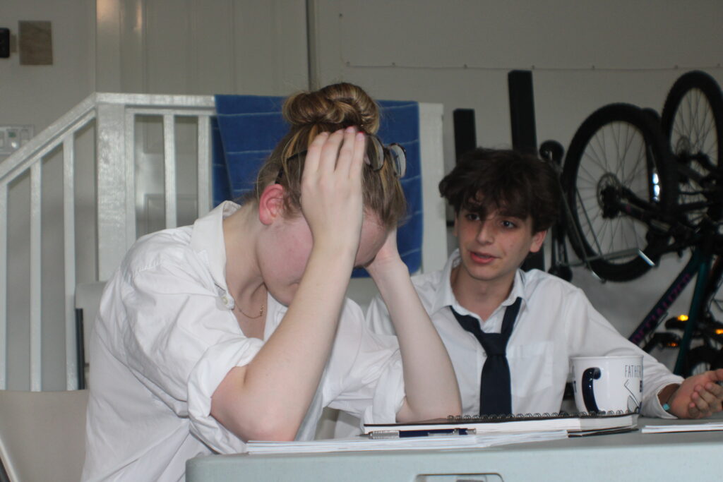 Rebecca Lembcke plays Emma in "American Pop," a disillusioned advertising employee who wants to quit her job (Photo by Ethan Bard)